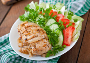 baked chicken breast fresh vegetables plate n