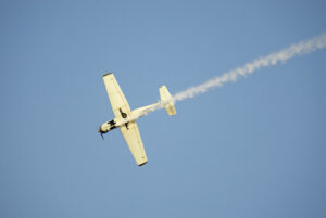 low angle shot white aircraft flying sky n