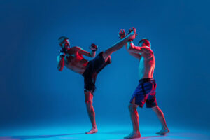 mma two professional fighters punching boxing isolated blue wall neon n