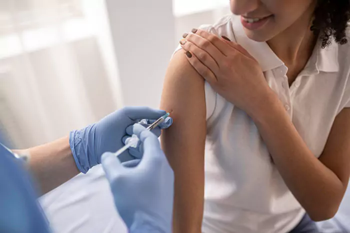 doctor vaccinating patient clinic n 6515563cf3b33